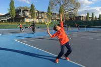player-serving-select-tennis-academy-summer-camps-min.jpg