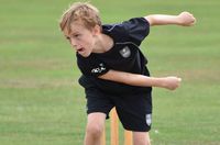 twenty20-cricket-child-bowling-for-summer-holiday-camp-epsom.jpg