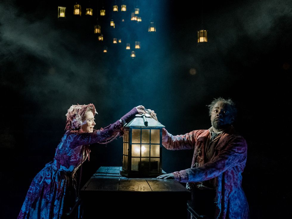 Melissa Allan (Little Fan) and Paterson Joseph (Scrooge) and cast of A Christmas Carol at The Old Vic. Photo by Manuel Harlan.jpg