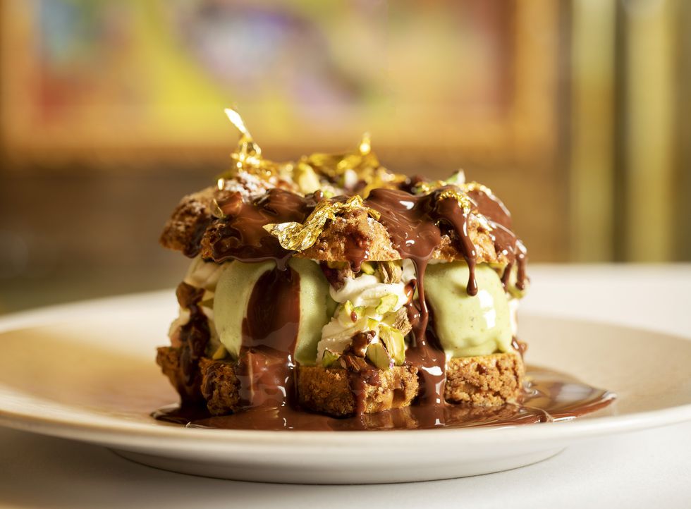 Paris-Brest dessert with pistachio and gold leaf.jpg