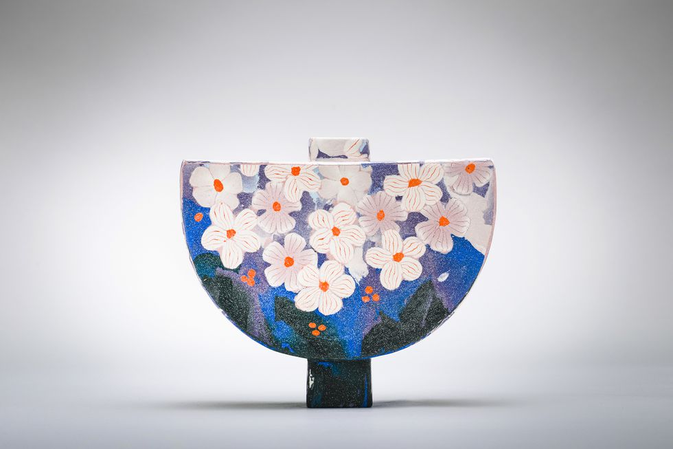 Small blossom semi circular vase.jpg