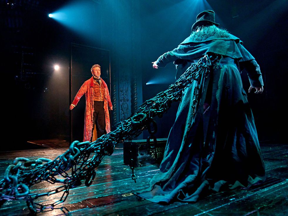 John Simm (Scrooge) and Mark Goldthorp (Father_Marley) in A Christmas Carol at The Old Vic (2024). Photo by Manuel Harlan (2).jpg