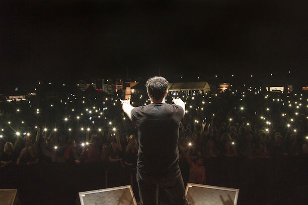 The crowd light up Loseley Park at ONE LIVE Credit Sam Pelly.jpg