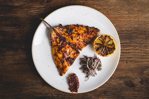 Boneless sea bream with harissa, preserved lemon, red onion and barberry salad.jpg