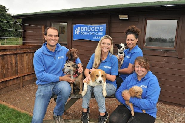 Bruce's Doggy Day Care - MD Bruce Casalis and some of the team copy.jpg